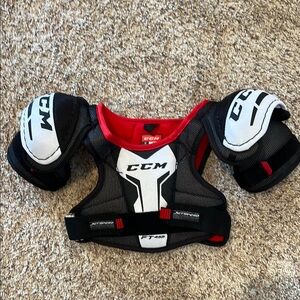 CCM Black, Red, and White Shoulder Pads